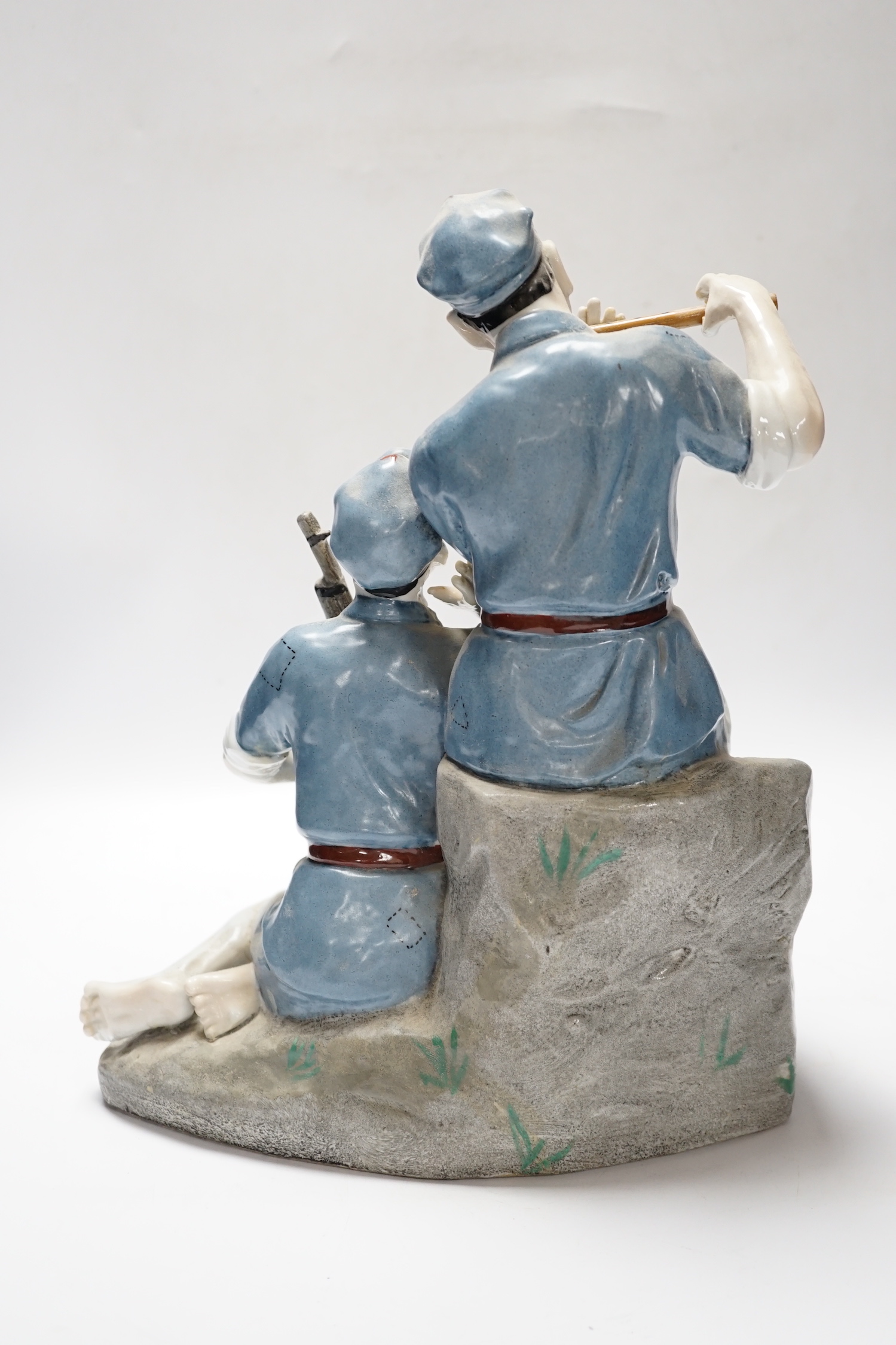 A Chinese Cultural revolution figure group, communist soldiers, 32cm high